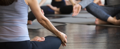Women doing yoga, practicing self care
